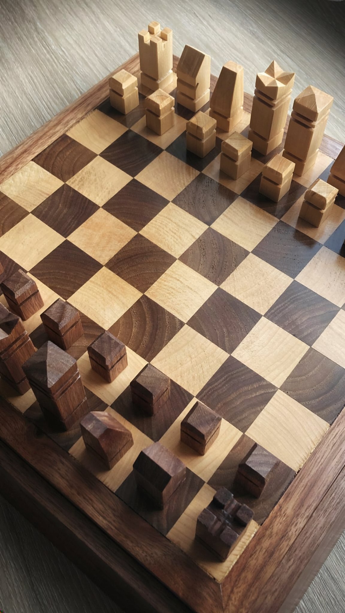 Walnut and linden chessboard serving as the lid of the storage base